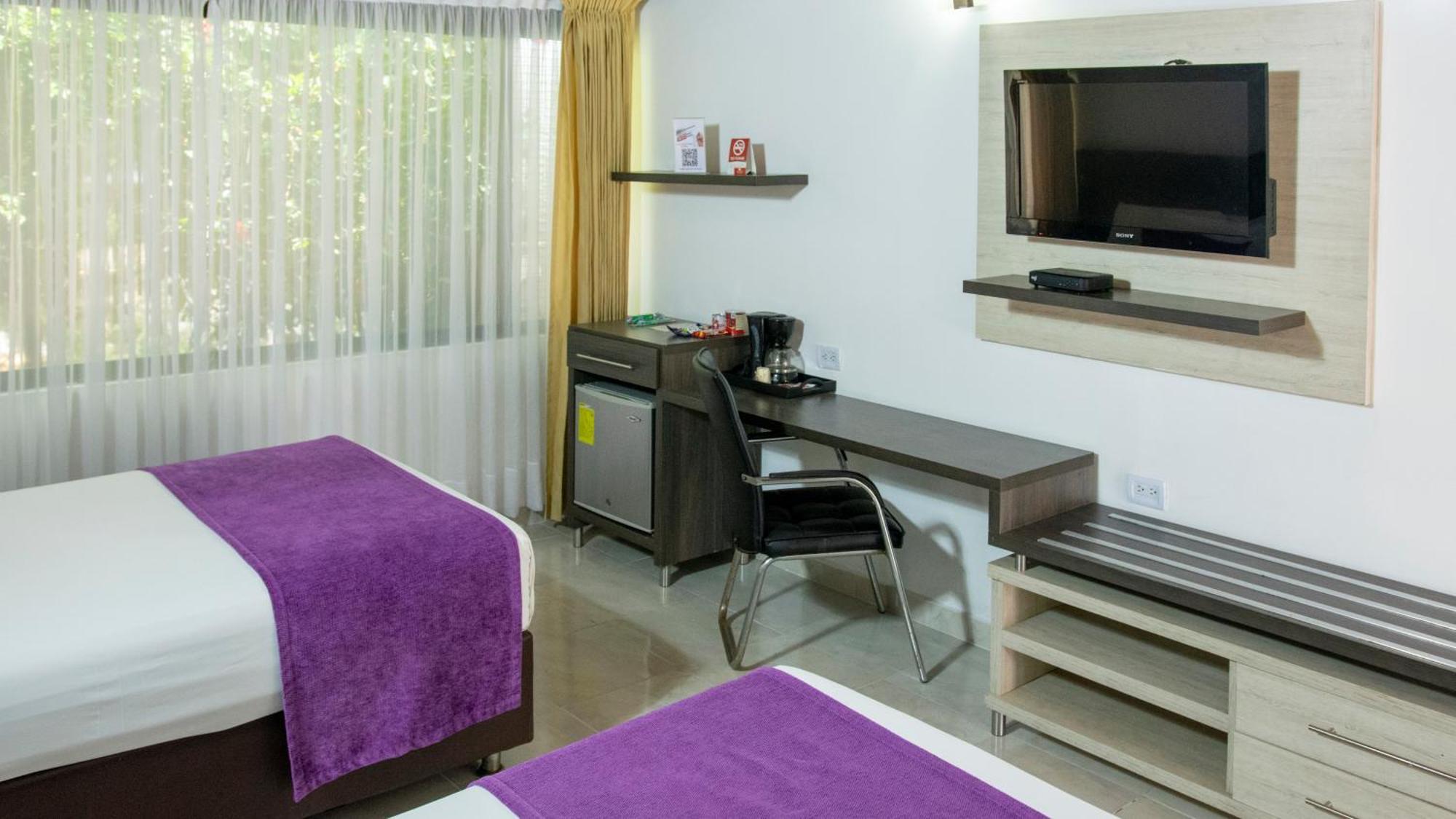 Hotel San Juan Internacional Girón Zimmer foto